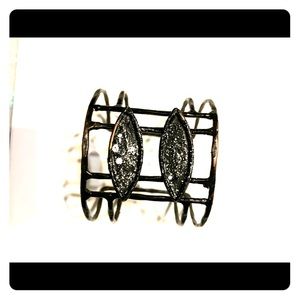 Stainless geometrical cuff bracelet in black.